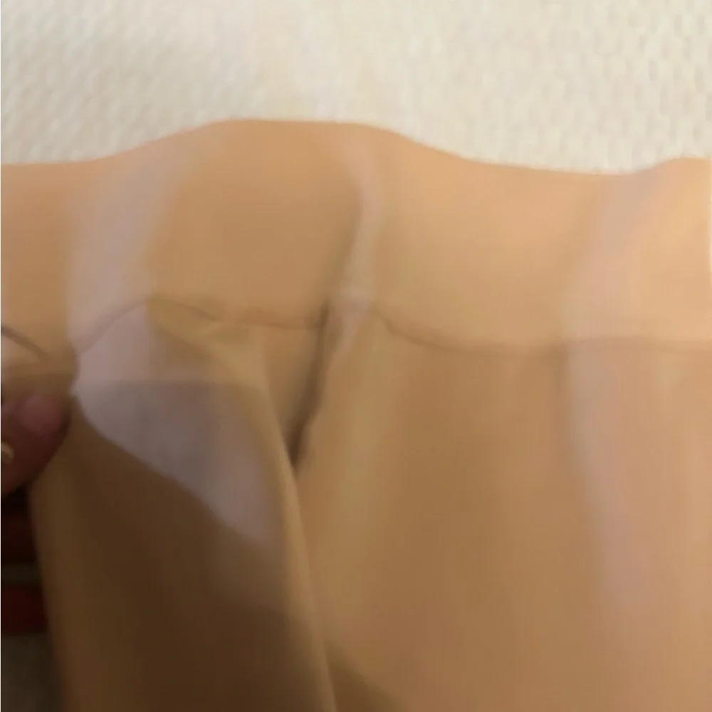 Source‎ Unknown Tan tights